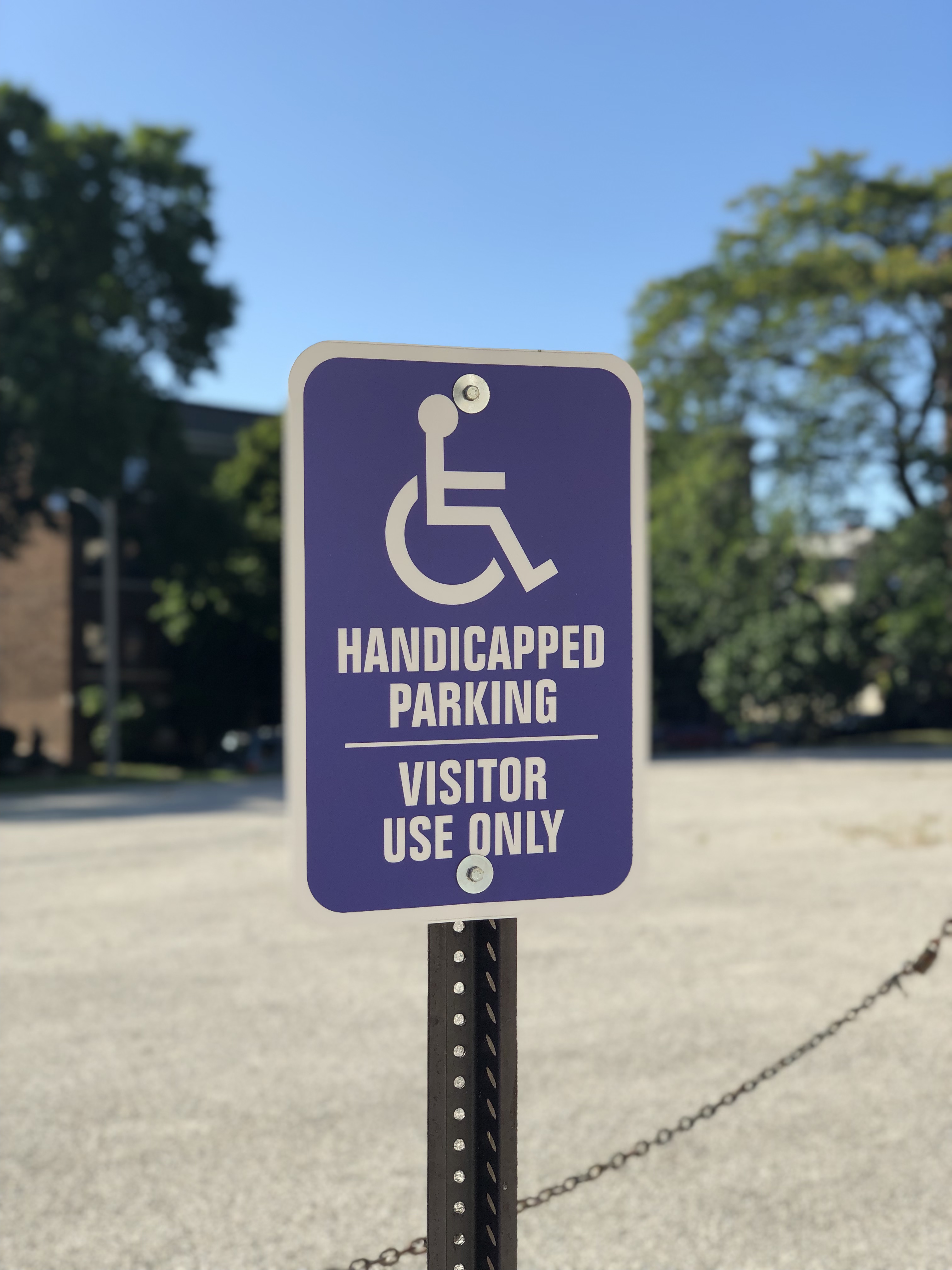 Blue disabled parking sign